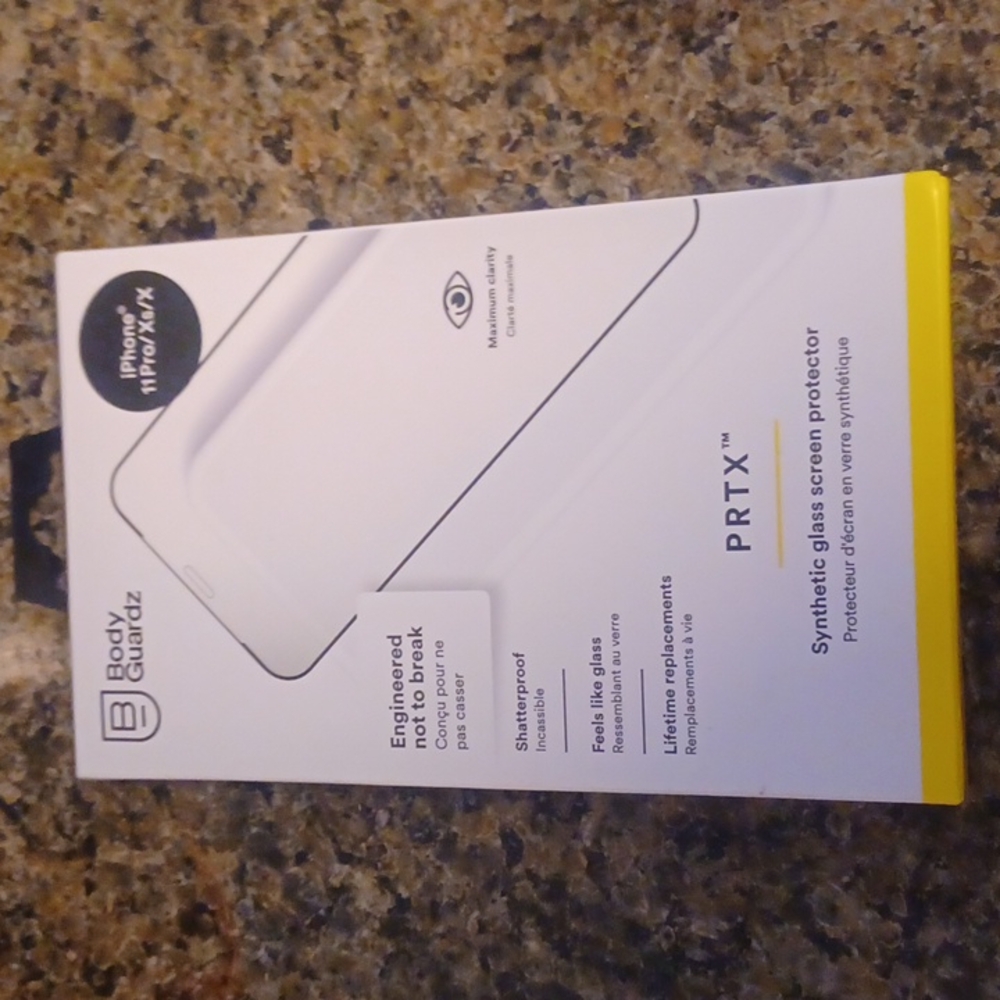 IPhone synthetic glass screen protector. Unopened box, never used, $50 value.